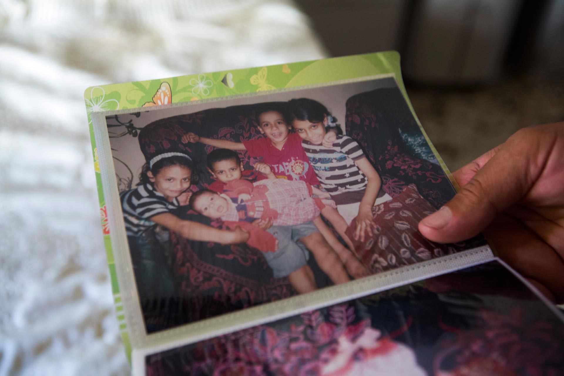 They had five little kids: Yassin, Sawsan, Rim, Elias and Yasser.
