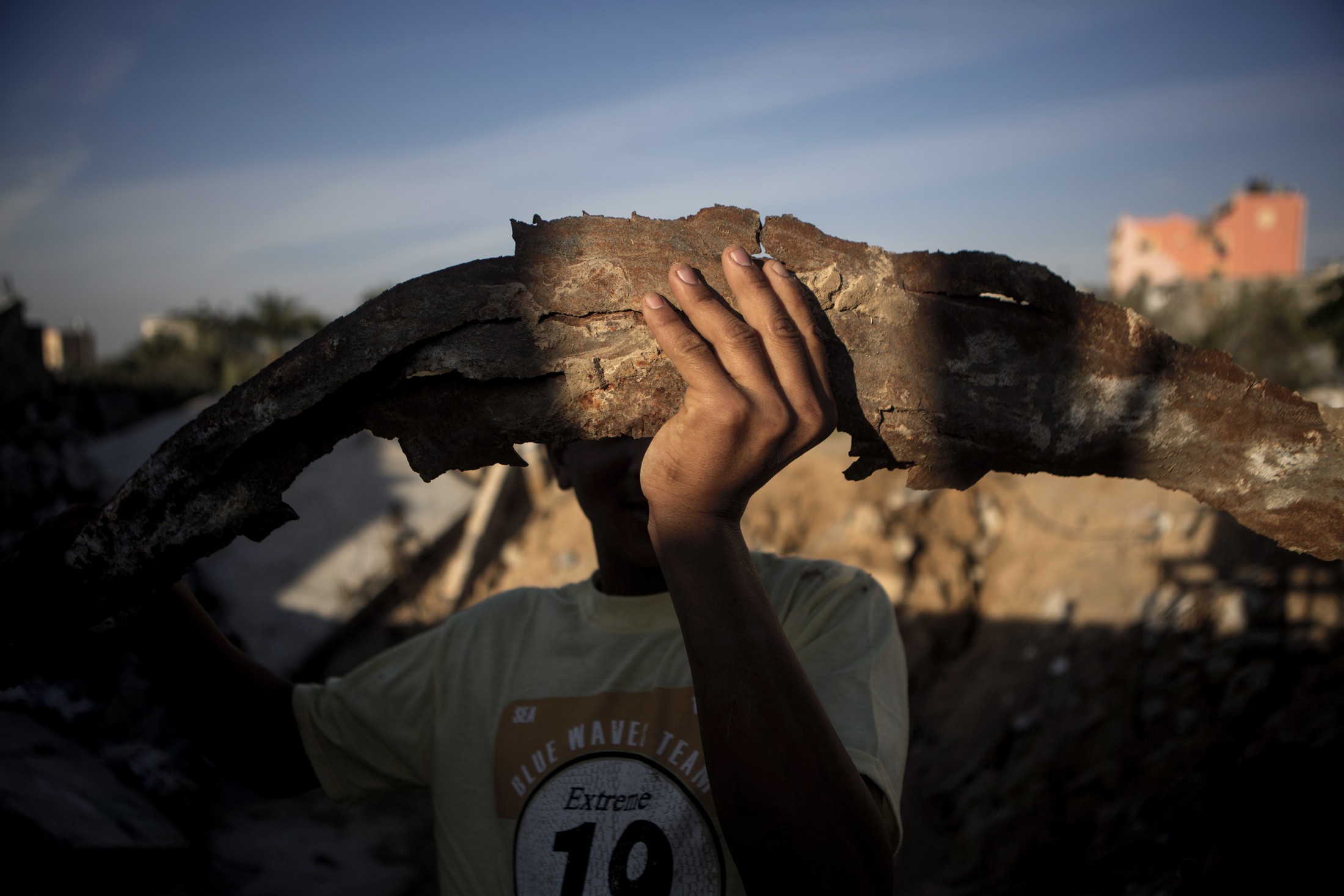 One boy climbed out of it, proudly displaying a piece of shrapnel.
